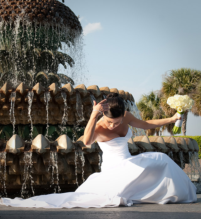 bride at the pineapple fountain, charleston sc