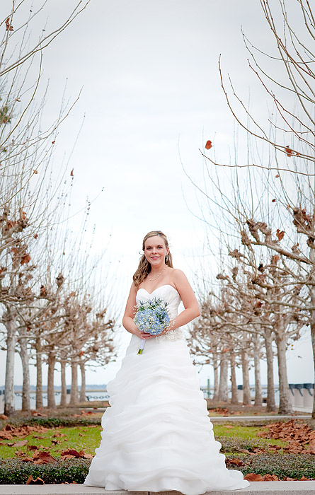 the bride is holding flowers