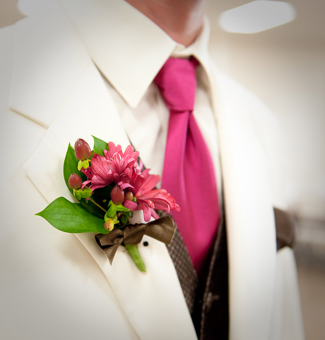 A boutonniere on the groom's wedding suit