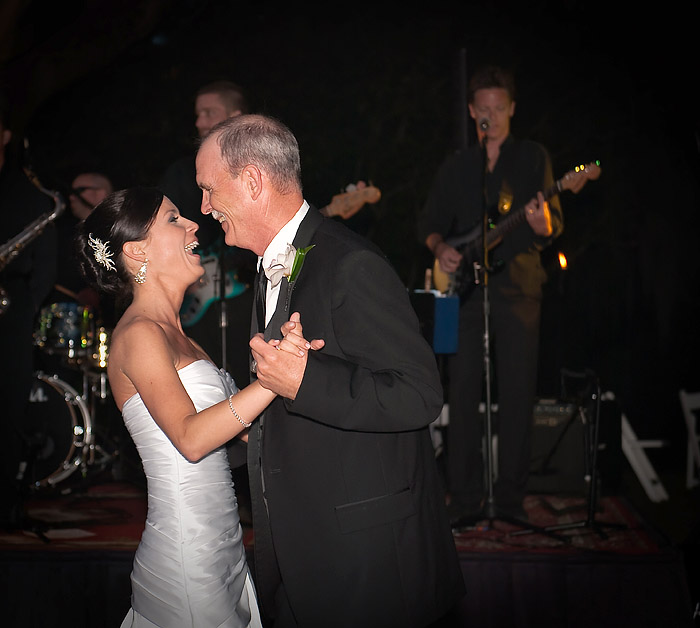 The bride is dancing with her father